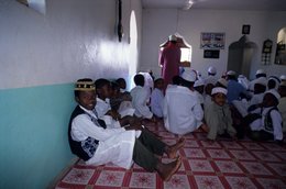 Boys;-Calligraphy;-Comoros-Archipelago;-France;-Indian-Ocean;-Interior;-Kaleidos;-Kaleidos-images;-Kofia;-La-parole-à-limage;-Laurent-Abad;-Mayotte;-Men;-Stories-Pictures;-White-clothes